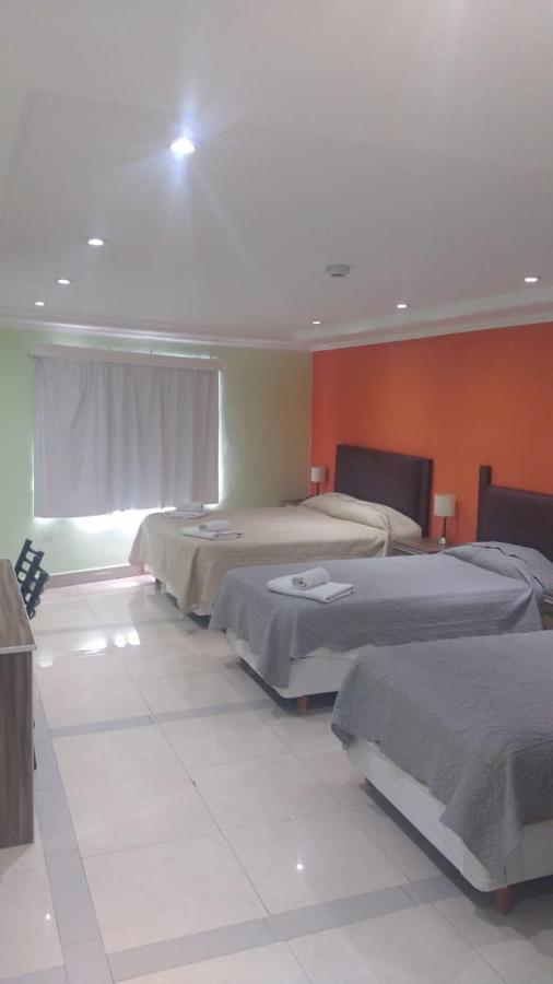 Hotel Caleta Olivia Buitenkant foto